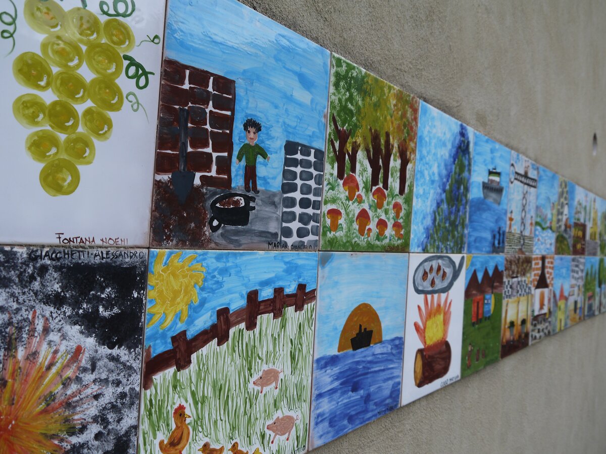 Drawings on paper made by local children, on display in Canistro Superiore