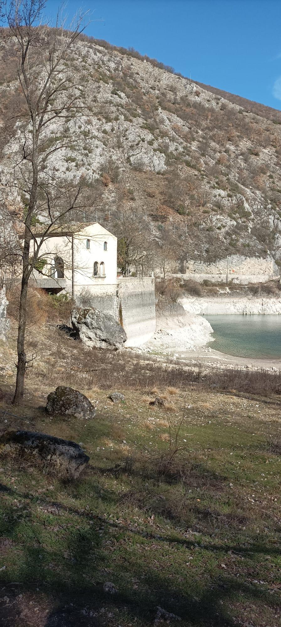The shores of Lake San Domenico at dusk, Villalago, Abruzzo